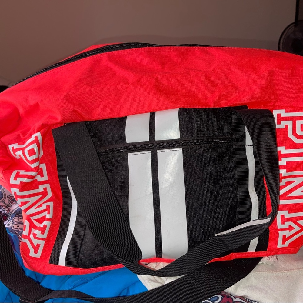 Pink duffel bag.